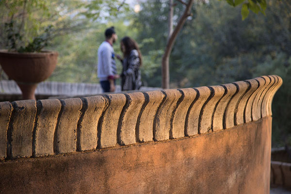 Couple on a balcony | Garden of Five Senses | India