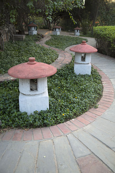 Pathway with mushroom-shaped lanterns | Garden of Five Senses | India