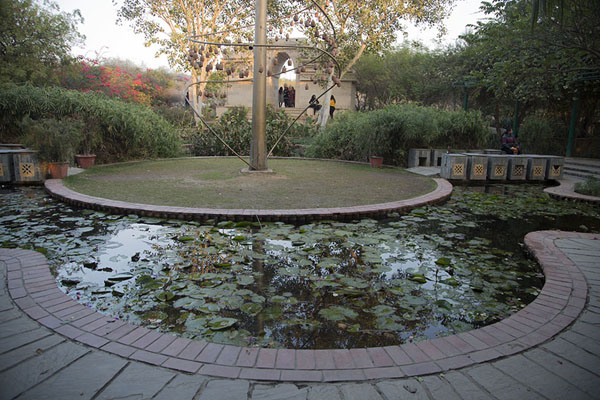 Small pond with a replica of the Jabná Arch | Garden of Five Senses | India