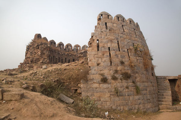 Looking up one of the defensive towers of Tughlaqabad Fort, India