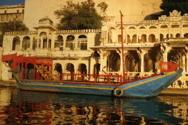 Boat moored to marble building in Udaipur | Udaipur | India
