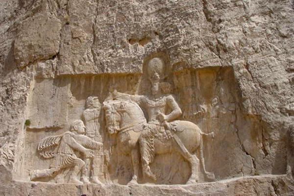 One of the reliefs hewn out in the cliffs under the tombs, Naghsh-e Rostam, Iran