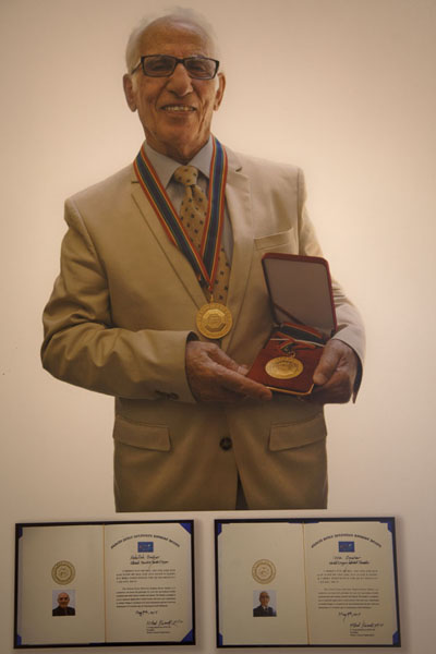 One of the Omidvar Brothers posing with prizes | Sa'd Abad Museum Complex | IrÃ¡n
