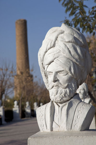 White bust in the foreground, minaret in the background, Iraq Close-up of bust with minaret in the background, Iraq