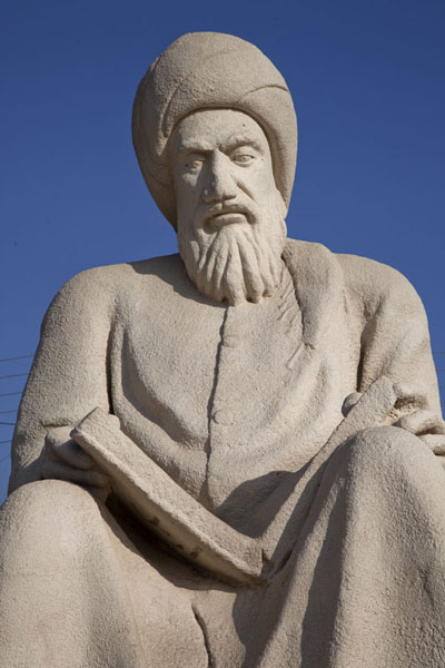 Wise man reading a book in Minaret Park, Iraq