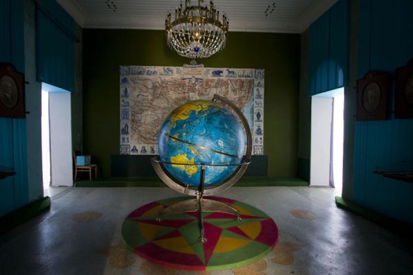 Main hall of the Przewalski museum with globe and map, Kyrgyzstan Globe with the travels of Przewalski, Kyrgyzstan