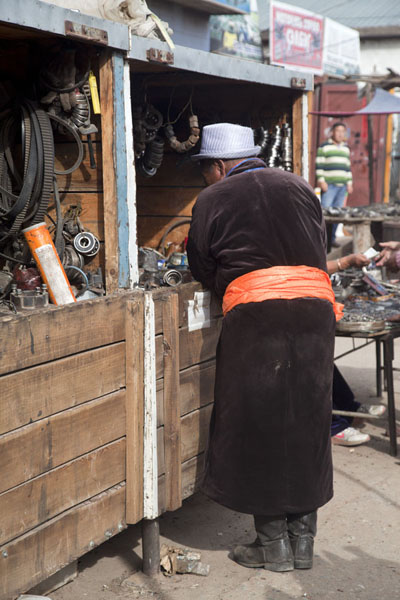 Man in traditional Mongolian dress at the market, Mörön, Mongolia