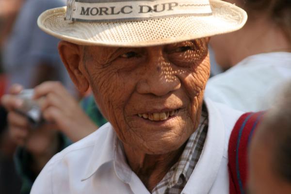 Old Burmese man at a street market, Myanmar