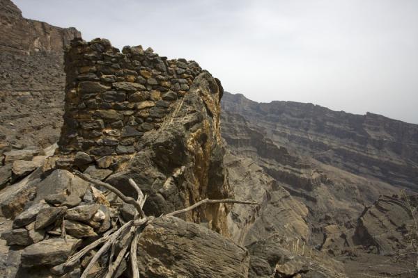 Old stone tower at Sap Bani Khamis | Jebel Shams Grand Canyon | Oman