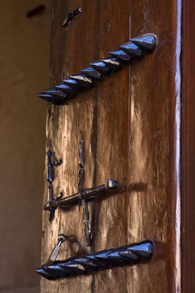 Picture of Detail of one of the ancient doors with spikesNakhal - Oman