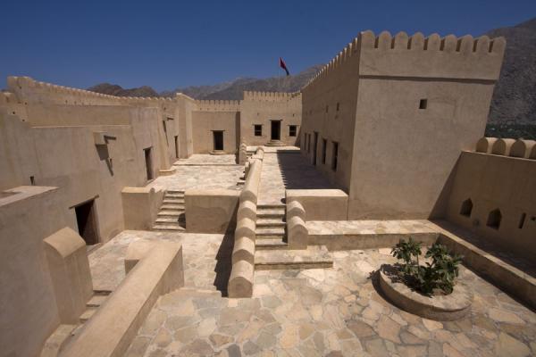 Picture of Upper part of Nakhal Fort with crenelated towers, stairs, and roomsNakhal - Oman