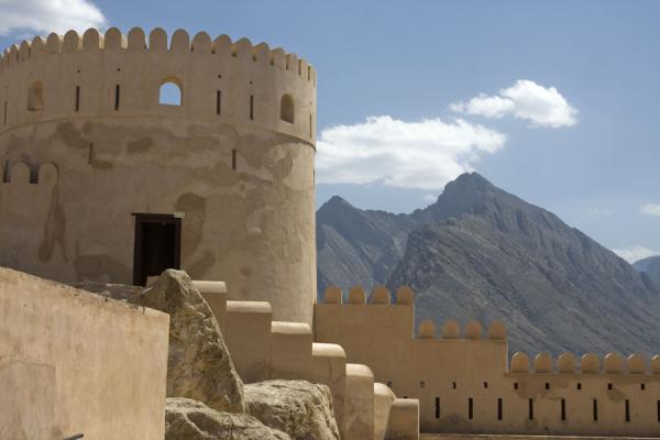 Picture of Defensive tower with mountainNakhal - Oman