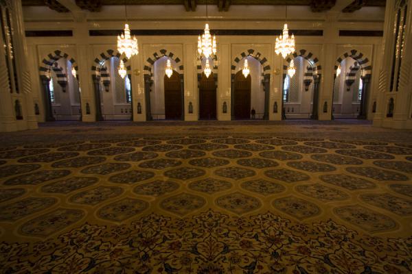 Picture of Carpet, arches and chandeliers in the main prayer hallMuscat - Oman