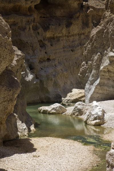 Cliffs in the Wadi Shab canyon, Oman Water running through the rocky cliffs of Wadi Shab, Oman