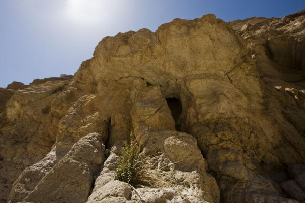 Looking up at the rocky cliffs of Wadi Shab, Oman