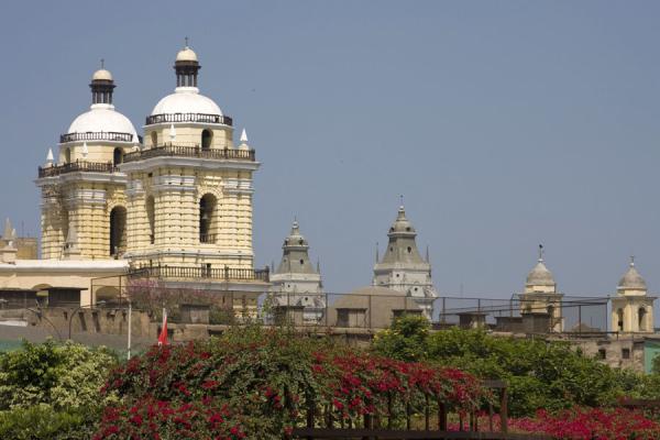 San Francisco church on the left, with other bell towers on the right, Peru