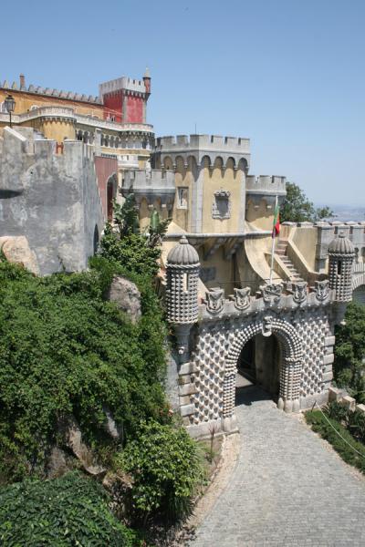 The main gate and part of the palace in the background, Portugal