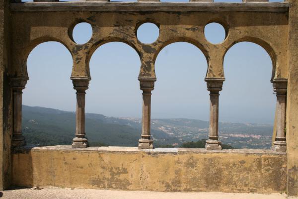 A splendid view towards the ocean through these arches, Portugal