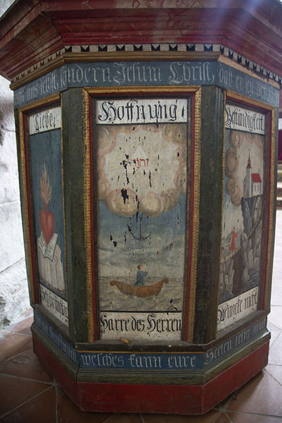 Wooden pulpit with German writing in the fortified church of Prejmer, Romania