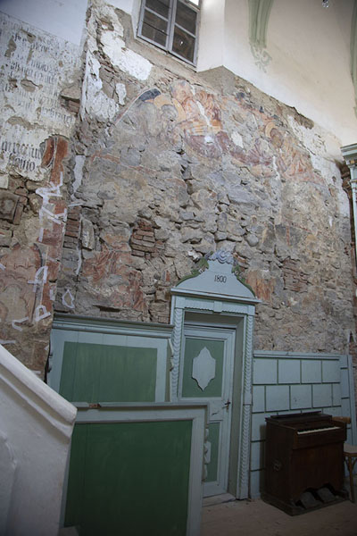 Frescoes on a wall in the fortified church of Buneşti, Romania