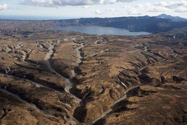 Karymskoye Lake with landscape carved out by volcanoes, Kamchatka from the air, Russia
