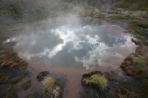Picture of Russia (Clouds and sky reflected in a hot pool in the Valley of Geysers)