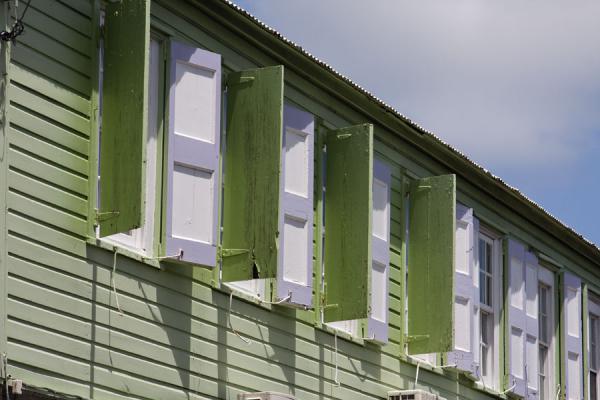 Green and white shutters in a building of Basseterre | Pigeon Island | Sainte Lucie