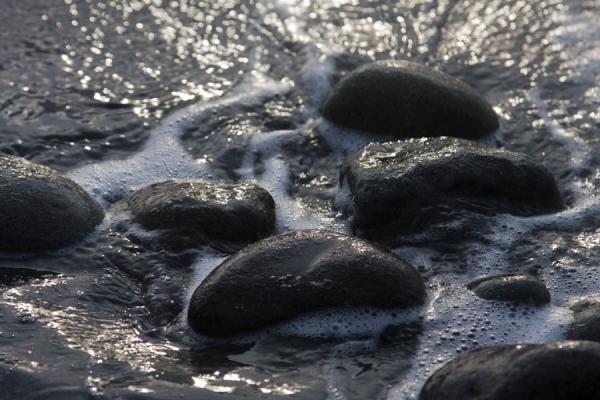Stones in the sea at Anse Chastanet beach, Saint Lucia