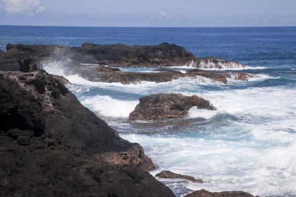 Waves crashing on the black lava rock coastline of To Sua | To Sua trench | Samoa