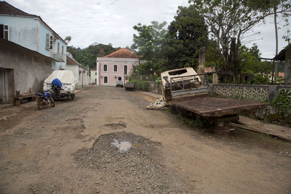 Wrecks of cars and bicycles line the streets of Santo Antonio, Santo Antonio, São Tomé and Príncipe