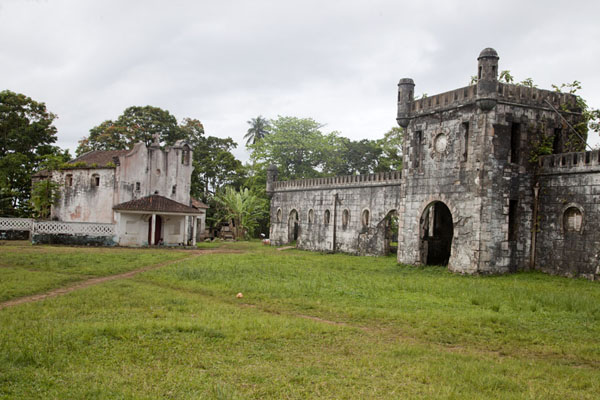 The Portuguese-style gate and church at the far end of the Sundy estate, Sundy, São Tomé and Príncipe