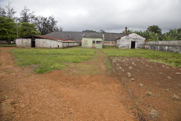 Some of the buildings of the plantation at the entrance of Sundy, Sundy, São Tomé and Príncipe