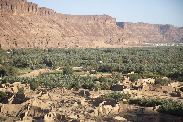 View over the palm trees and ruins of farms across the road, seen from the castle of the old town, Al Ula old town, Saudi Arabia