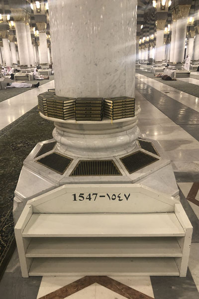 One of the hundreds of pillars of Prophet Mosque with a case to leave shoes, Medina mosques, Saudi Arabia
