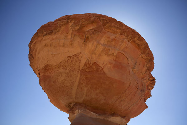 Looking to the sky with Mushroom Rock in the foreground, Saudi Arabia View from below of Mushroom Rock, Saudi Arabia