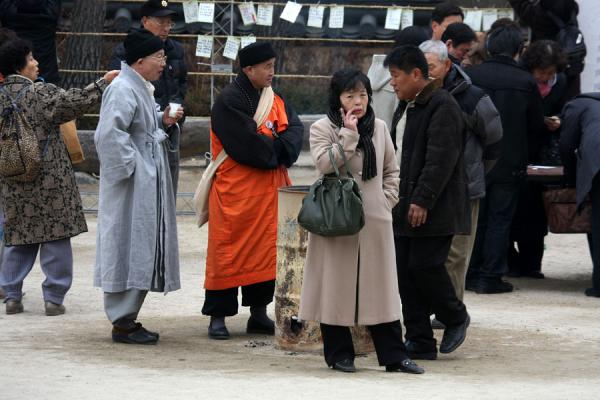 People in the courtyard of Jogyesa, South Korea