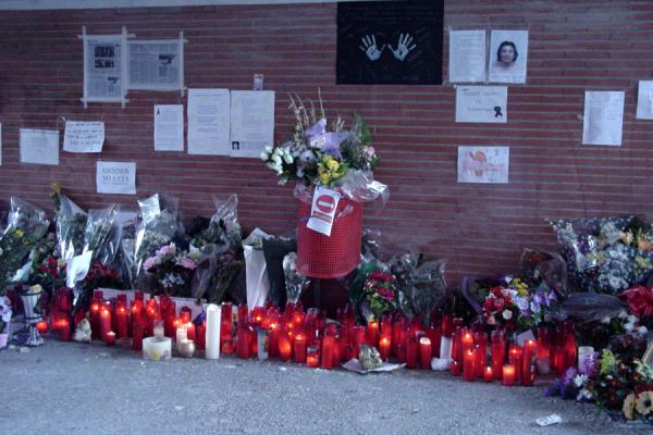 Some of the candles and flowers at El Pozo station, Madrid, Spain