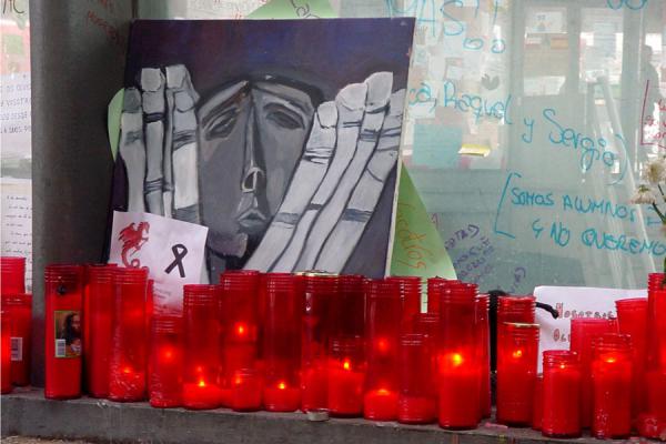 Candles and notes, Atocha station, Madrid, Spain