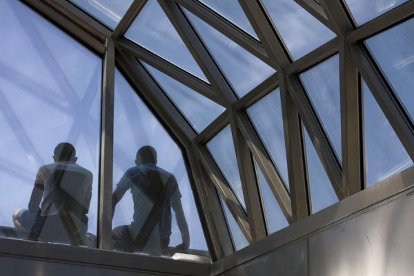 Picture of Two guys sitting at the modern subway stationMadrid - Spain