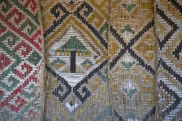 Mats of various patterns and colours on a house in Suai Loro | Suai Loro | Oost Timor