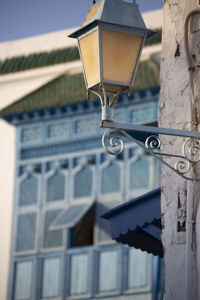 Lantern and wooden balcony in the background in Sidi Bou Said, Tunisia