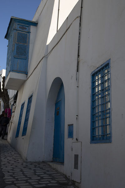 Street with houses and balcony in Sidi Bou Said, Tunisia