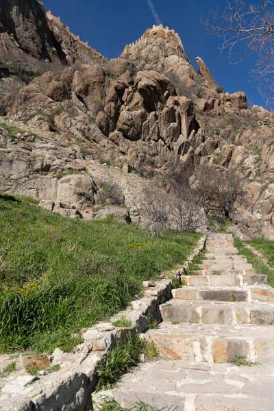 Stone steps climbing toward Afyonkarahisar Castle above the city, Türkiye