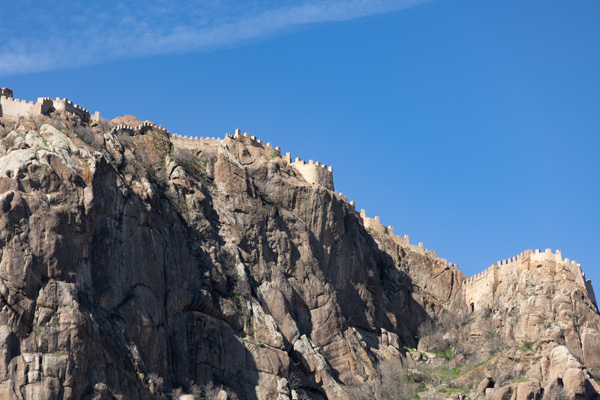 Battlements of Afyonkarahisar Castle crowning the volcanic rock, Türkiye