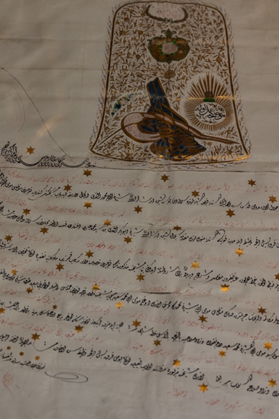 Foto van An Ottoman imperial firman with tughra and gold stars in the Mevlâna MuseumKonya - Turkije