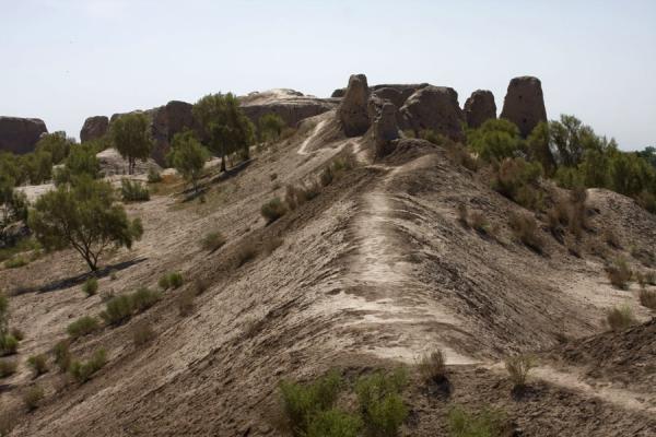 A path leads right over the top of the city wall of Izmukshir, Izmukshir, Turkmenistan