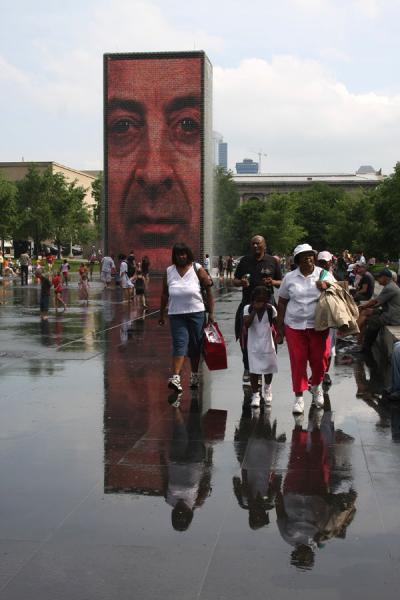 Family walking on water at the water towers, United States