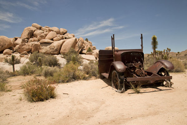 A vehicle rusting away near Wall Street Mill | Joshua Tree National Park | United States