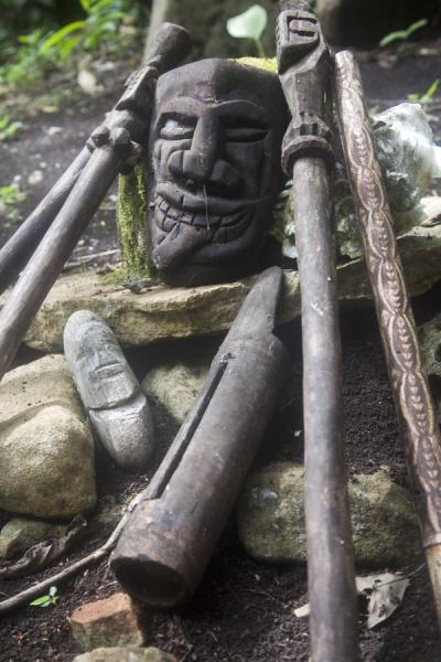 Small tam-tams and sticks used to club pigs to death during one of the feasts of the village | Lawor cannibal site | Vanuatu