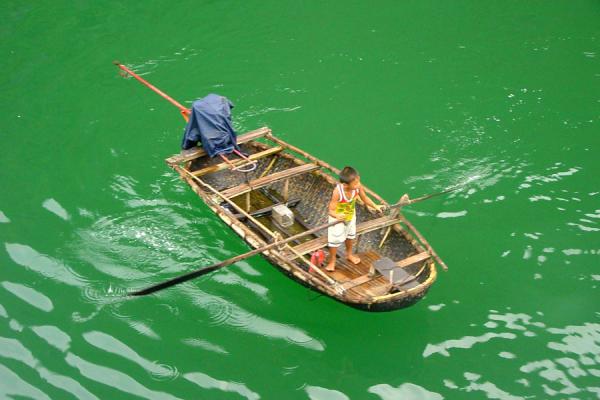 Small boy on a boat, Halong Bay, Vietnam